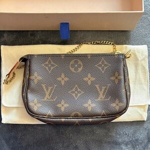 Louis Vuitton Monogram Canvas Clutch with Gold Chain